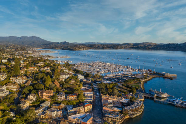 Aerial View of Sausalito and Marina on a Golden morning An aerial view of Sausalito on a golden morning. The sun is shining on the hillside and a view of the marina and bay. marin county stock pictures, royalty-free photos & images