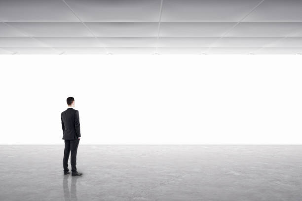 istock Young businessman in gallery interior 1210372451