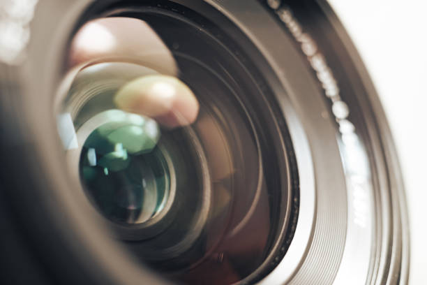 istock Close up beautiful camera lens on a gray background. 1210376668