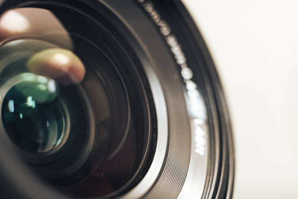 istock Close up beautiful camera lens on a gray background. 1210376698