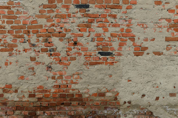 istock Full old cracked brick wall surface with cracks in full screen 1210377959