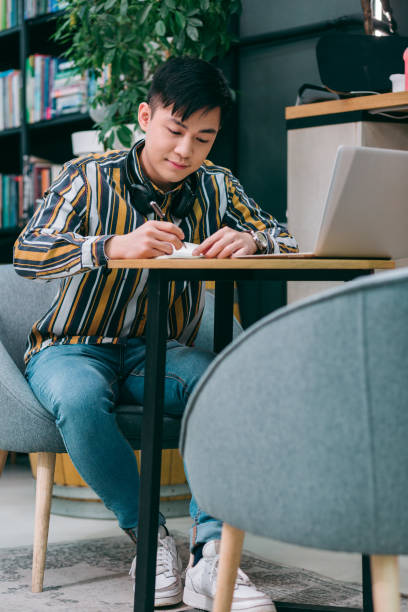 istock Writing down all the interesting ideas stock photo 1210378373