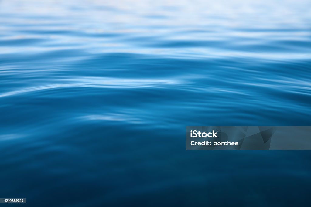Soft Water Background Close-up of rippled sea surface. Water Stock Photo