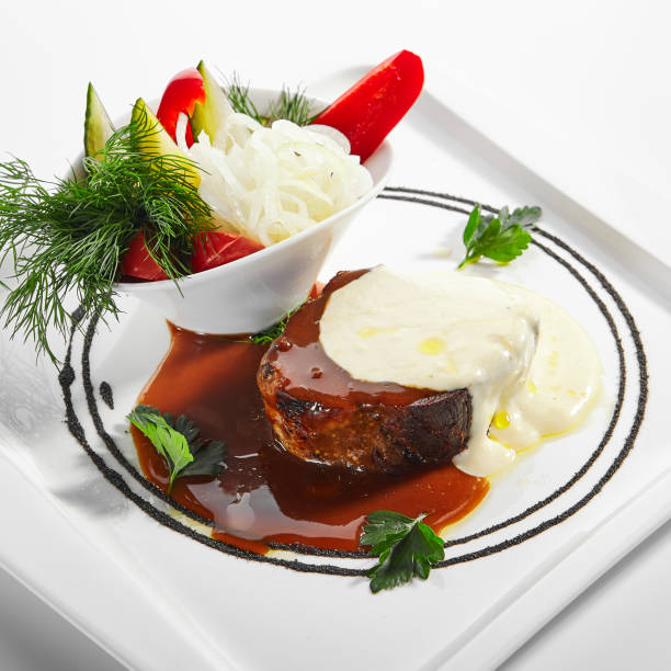 istock Pork neck confit with pickled vegetables 1210383163