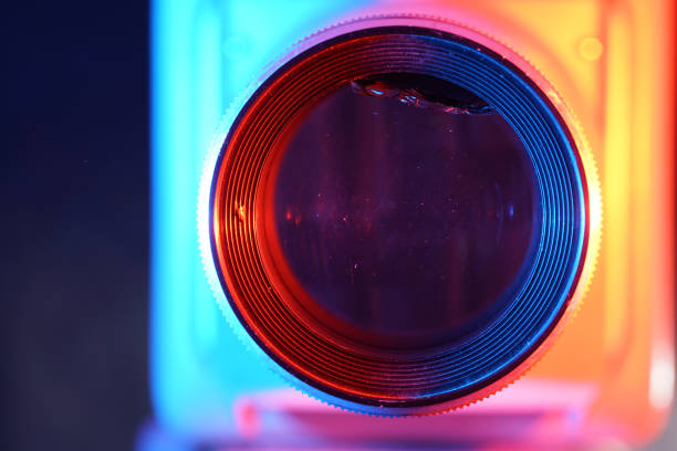 istock Old slide projector with slide frame photographed in the studio with flash light 1210384342