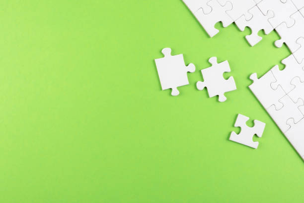 istock top view of white blank unfinished jigsaw puzzle 1210384665