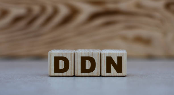 istock concept word DDN on cubes on a beautiful wooden background 1210387429