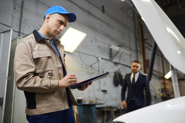 istock Car Repairman At Work 1210388753
