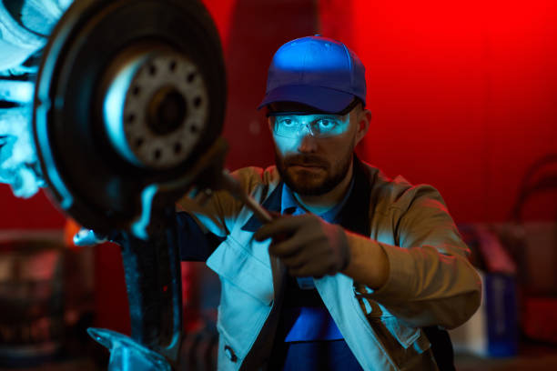 istock Seriuos Man Repairing Car 1210389390