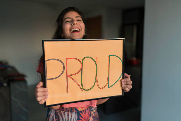 istock Young Woman Handheld Sign 1210391601