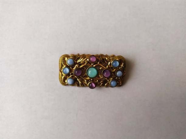 istock Old vintage brooch isolated on a white background 1210391765