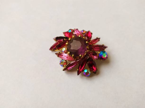 istock Old vintage brooch isolated on a white background 1210392114