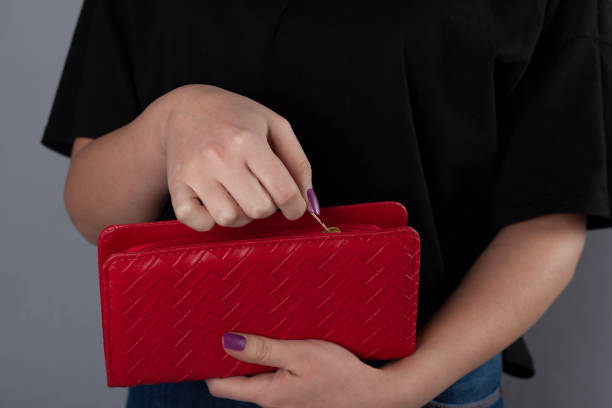 istock woman hand bag 1210392866