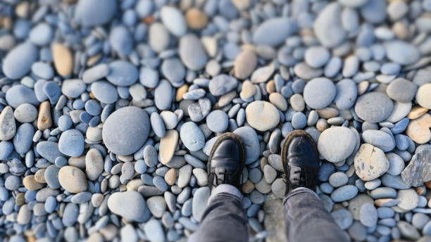 istock Boots Standing on pebbles at Olympic National Park 1210392880