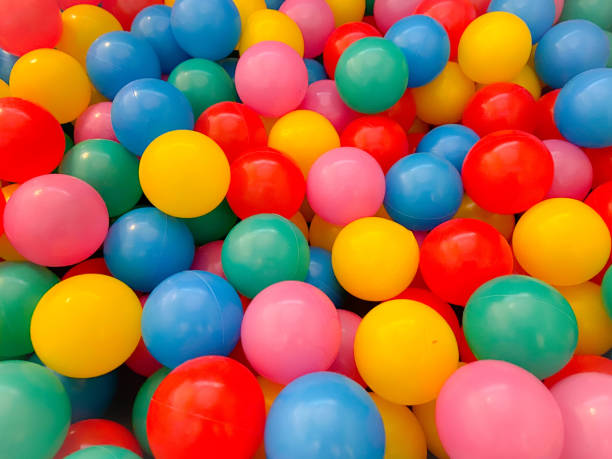 istock Ball pool with colourful balls to play 1210394589