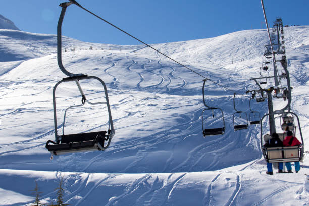 istock Freerider snowboarder running downhill. 1210395987