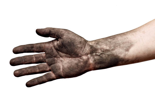 istock hand handshake agreement deal dirty coal worker arm 1210403118