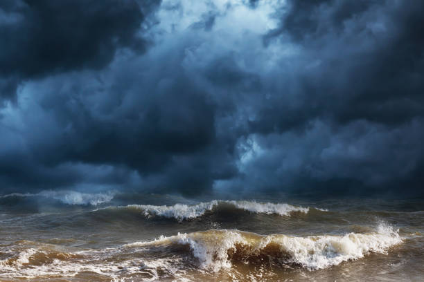 istock Thunderclouds and storm at sea. Nature background 1210403182