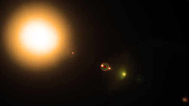 istock Abstract Natural Sun flare or Far star on the black background 1210405016