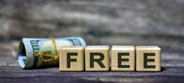 istock FREE word concept on cubes with a Banknote 1210415587