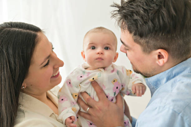 istock A Young mother and father with newborn 1210417564