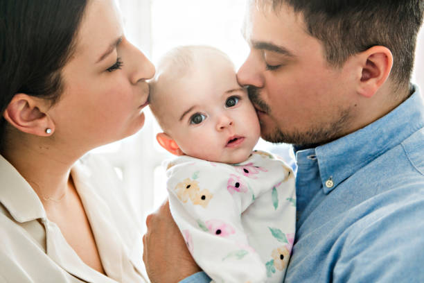 istock A Young mother and father with newborn 1210417593