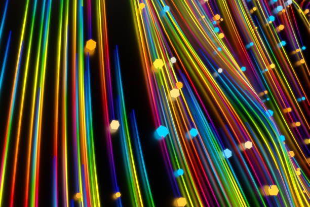 istock Neon glowing twisted cosmic lines on the glossy surface. Turbulence curls flow colorful motion. Fluid and smooth astronomy vortex swirl structure. 3d rendering Abstract creative modern background 1210422037