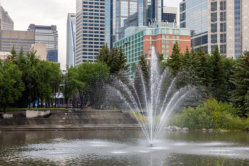 Flowing fountain at Prince's Island Park with the city view