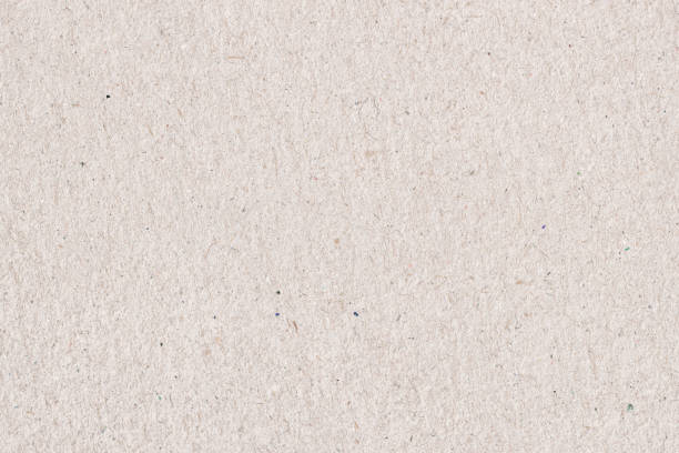 istock Organic cardboard texture close-up. Grunge old paper surface texture. Recyclable material, has small inclusions of cellulose, various villi, fluff 1210424906