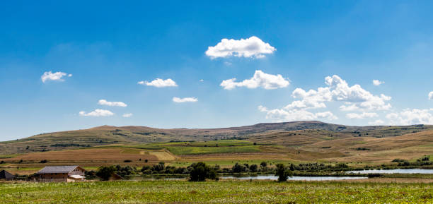 istock Lake house in a wild scenery 1210426207
