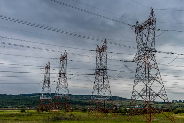 istock High voltage power lines on power pylons 1210426667