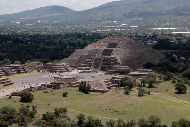 istock Teotihuacan, full pyramid view, many visitors, blue sky 1210427451