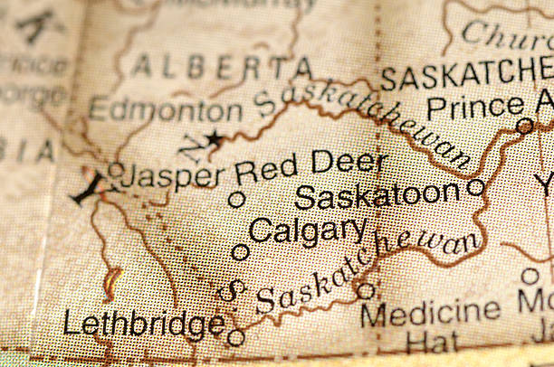 Calgary and Saskatoon A close-up/macro photograph of Calgary and Saskatoon from a desktop globe. Adobe RGB color profile. lethbridge alberta stock pictures, royalty-free photos & images