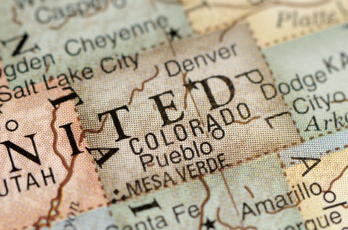 USA map with marked state of Colorado and potato beetle