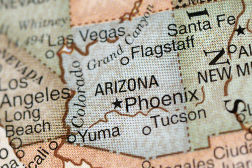 A close-up/macro photograph of Arizona from a desktop globe. Adobe RGB color profile.