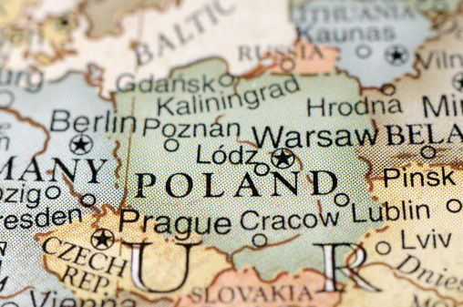 A close-up/macro photograph of Poland from a desktop globe. Adobe RGB color profile.