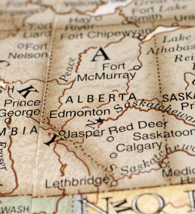 A close-up/macro photograph of Alberta from a desktop globe. Adobe RGB color profile.