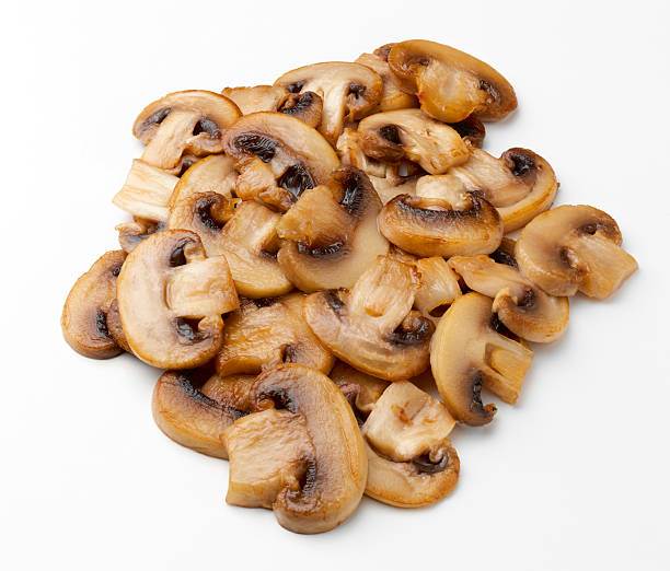 pile of cooked mushrooms  sauteed stock pictures, royalty-free photos & images