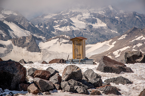 Close up of one wooden toilet. Mount Elbrus, Caucasus, Russia.  \