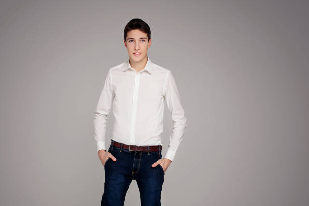 istock Handsome teenage boy in elegant clothes. 1210440906
