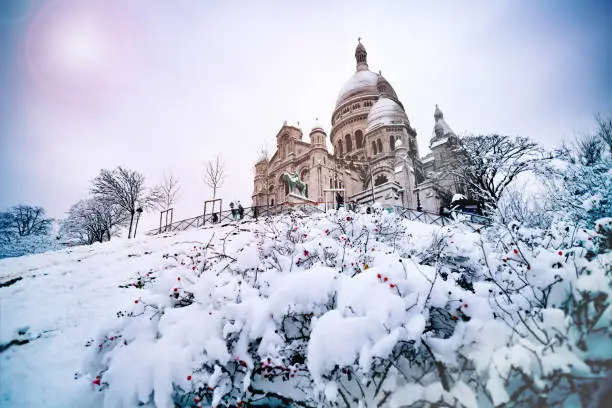 Winter snow day view of Sacre-Cur cathedral on Montmartre, Paris, France