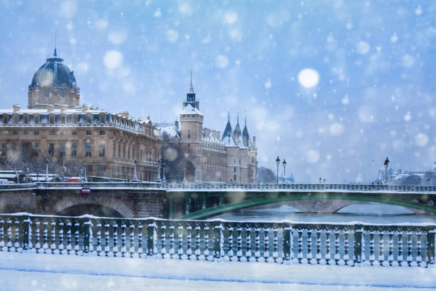 istock Bridge d'Arcole view on notre Dame bridge under snow 1210442177
