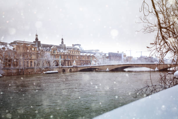 istock Flooded Seine river in Paris downtown under snow 1210442196