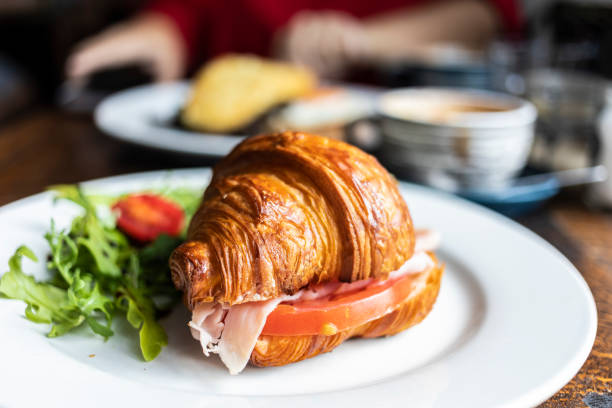 Melbourne, Australia. Picture shows typical croissant breakfast coffee in a cafe.