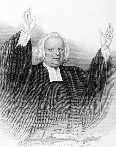 John Wesley John Wesley (1703-1791) preaching over an open bible on engraving from the 1833. Anglican cleric and Christian theologian. Published in London by L.Tallis. methodist stock illustrations