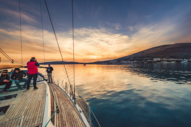 adventure friends on the sailing boat - weather time travel locations nature imagens e fotografias de stock