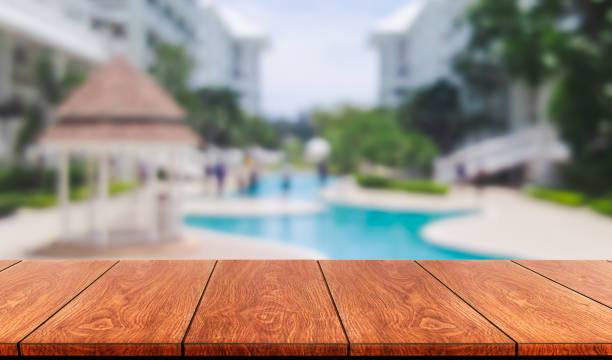 istock Wood table in summer resort holiday vacation. 1210454555