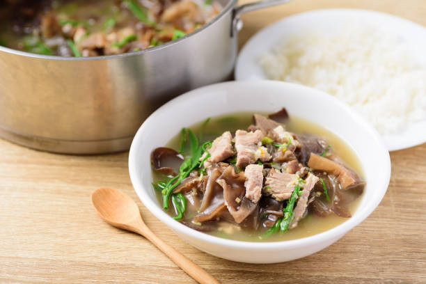 istock Spicy brown jelly mushroom soup with pork 1210454615