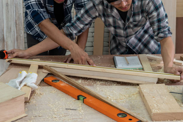 istock Carpenter working on wood craft at workshopCarpenter working on wood craft at workshop 1210457654