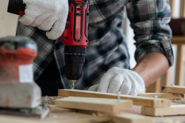 istock Carpenter working on wood craft at workshopCarpenter working on wood craft at workshop 1210457724